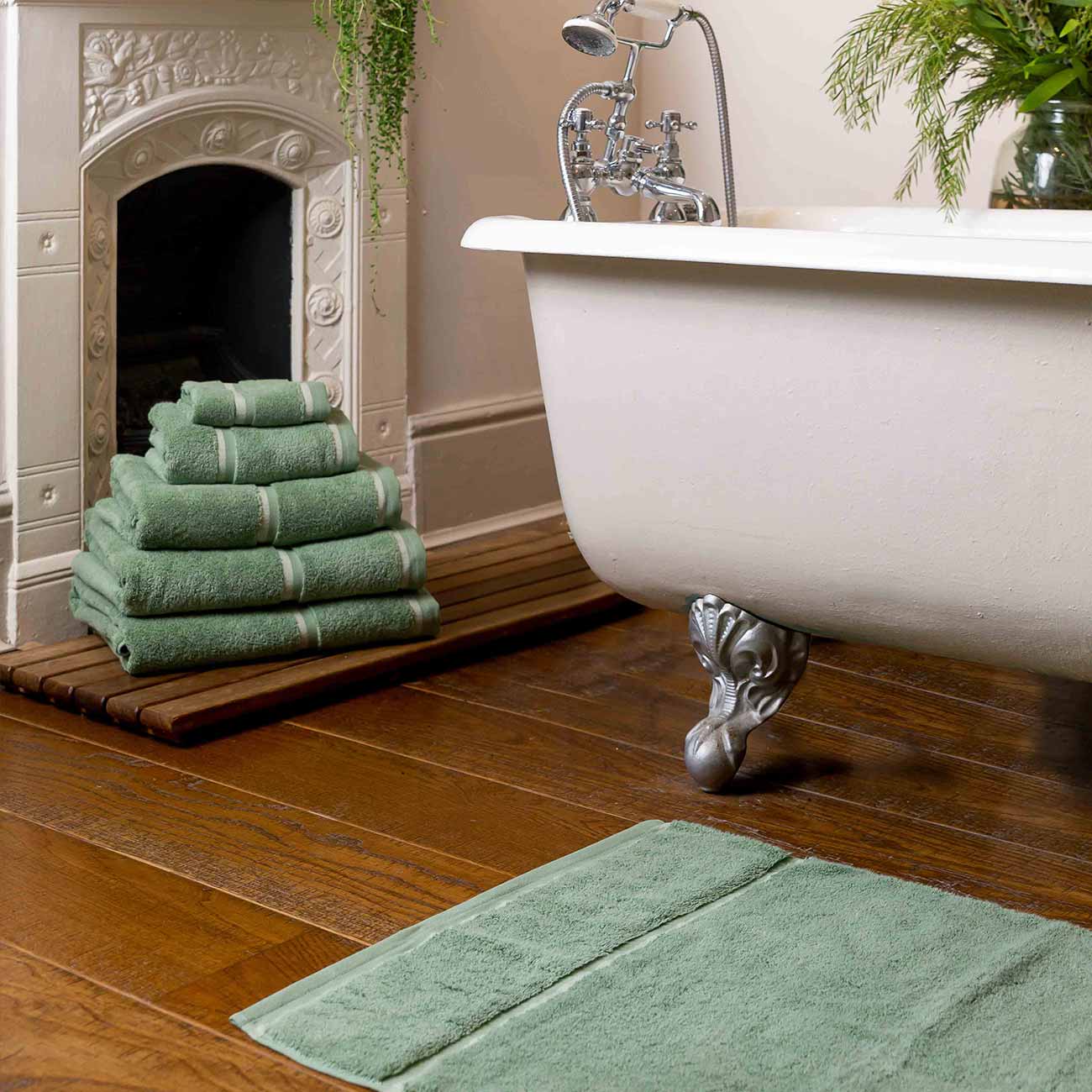 Green bath discount mat and towels